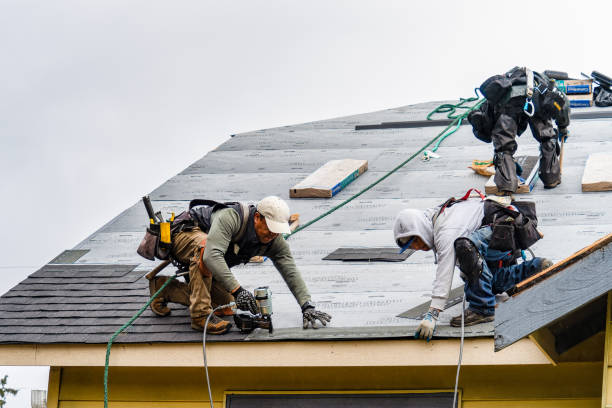 Professional Gutter Installation technician working in Rumford, RI